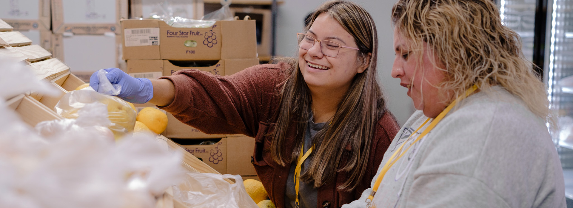 Two woman in food pantry